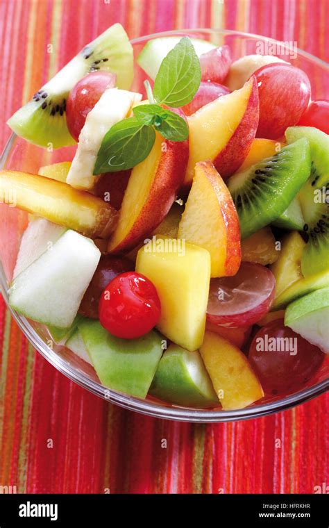 Fruit Salad Kiwis Grapes Apples Bananas And Mangoes Stock Photo Alamy