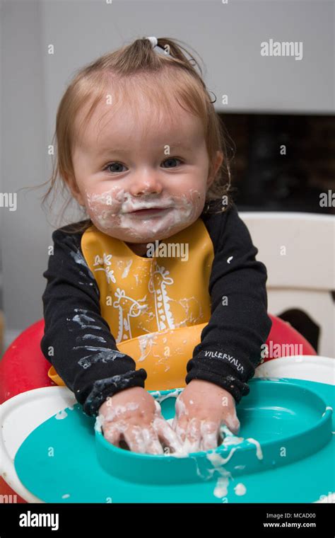 9 Month Old Baby Eating Yoghurt Baby Led Weaning Stock Photo Alamy