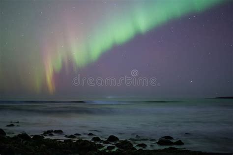 Aurora Borealis Over Breaking Waves Calm Purple Sky Stock Photo Image