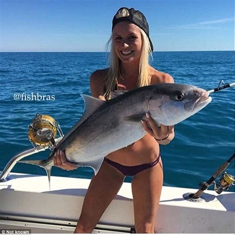 Topless Female Anglers Pose With Fish Covering Their Breasts As Trend Sweeps Instagram Daily