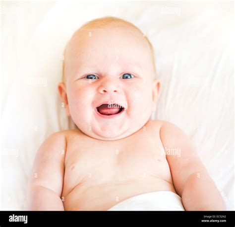 Adorable Newborn Baby Lying On Bed Hi Res Stock Photography And Images