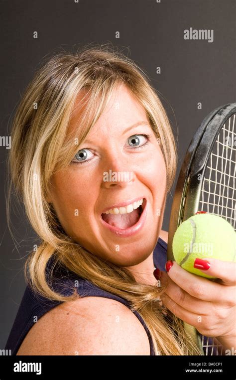 Happy Smiling Female Tennis Player With Racquet And Ball Healthy