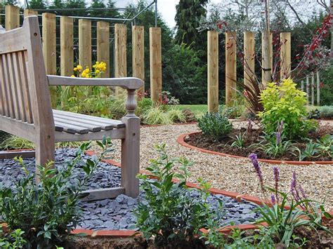 This small garden bench is decorated with an engraved inscription, making the whole much more appealing. Small Gardens - Longacres Landscape