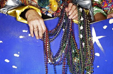 the reason we throw beads at mardi gras