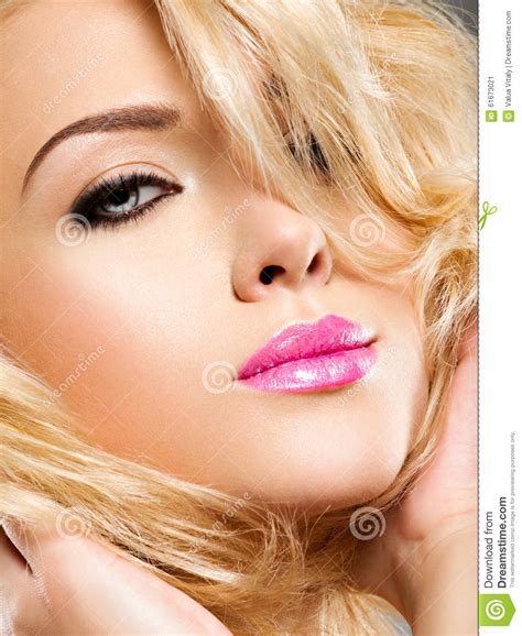 Closeup Face Of A Fashion Model With Pink Lips And Black