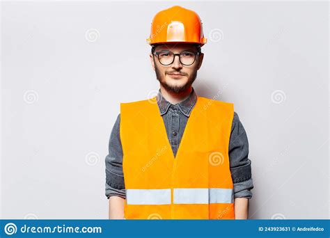 Photo Of Young Building Constructor Wearing Orange Hard Hat And