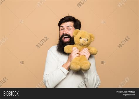 Man Holds Teddy Bear Image And Photo Free Trial Bigstock