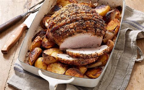 Place the potatoes around the pork loin and roast for an additional 45 to 60 minutes or until the pork registers at least 155 degrees f on a meat thermometer. Pork leg roast with roasted shallots and potatoes