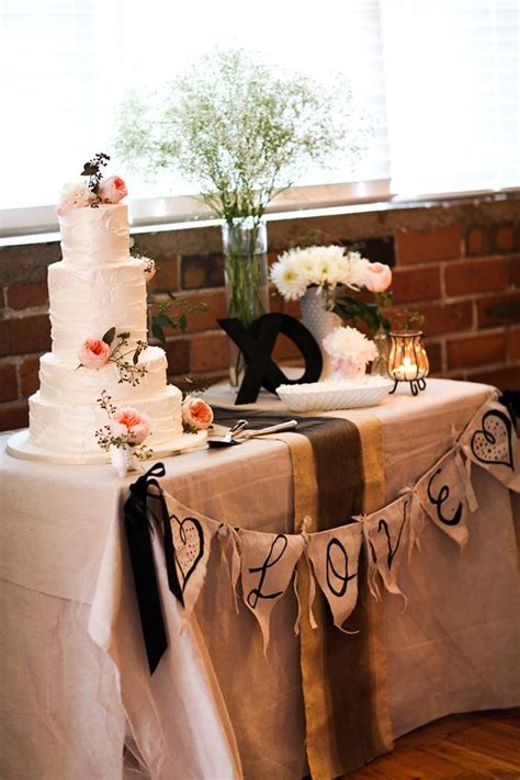 Consider using a variety of displays and stands as seen in this cake table. DIY Woodsy Michigan Wedding ⋆ Ruffled | Wedding cake table decorations, Cake table decorations ...