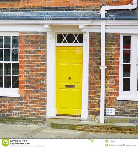 List 98 Pictures Red Brick House With Yellow Door Sharp