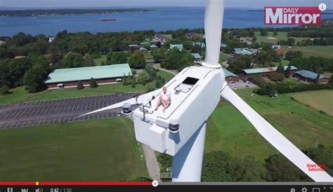 Drone Footage Captures Sunbather Atop Portsmouth Wind Turbine