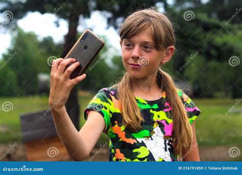 Selfie A Ten Year Old Girl Poses And Takes A Selfie By Hand Stock