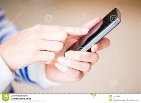 Sending a text message stock photo. Image of networking - 25433268