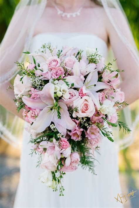 bridal bouquet small cascade light pink lilies and pink roses beautiful pallet lily