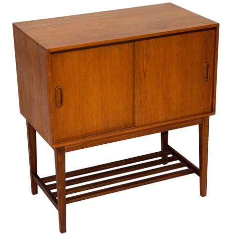 Keeping it funky with this ultra cool teak record cabinet. Mid-Century Danish Teak Record Cabinet at 1stdibs