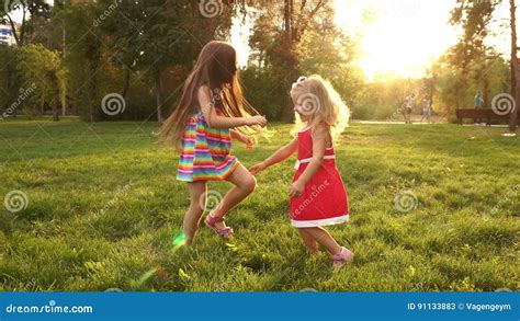Two Sisters Holding Hands Circling Stock Video Video Of Forest Flower 91133883