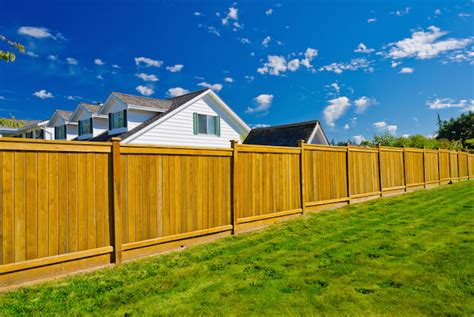 Cost factors of installing a garden fence. Wood Fence Vs. Chain Link Fence | Fence Cost Comparison