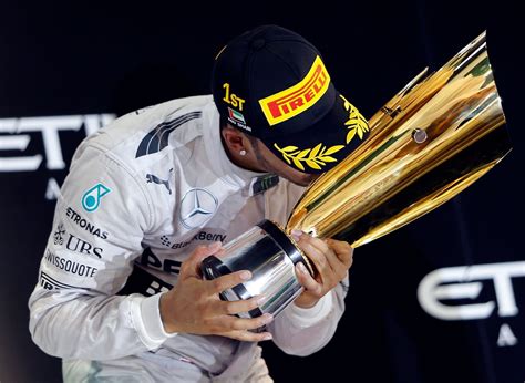 Mercedes Formula One Driver Lewis Hamilton Of Britain Celebrates On The Podium After Winning The