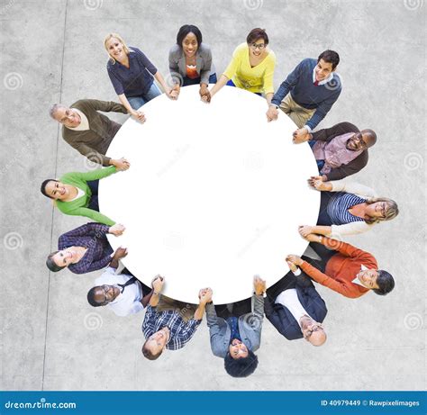 Multiethnic People Forming A Circle Holding Hands Stock Image