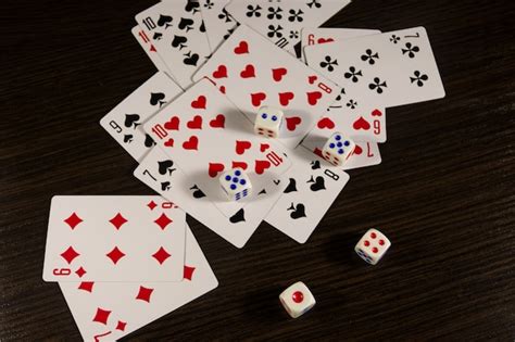 Premium Photo Playing Cards And Dice On A Table Game Concept