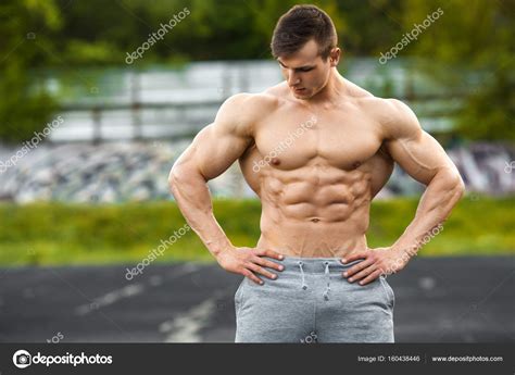 Muscular Man Working Out Outdoor Strong Male Naked Torso Abs Outside
