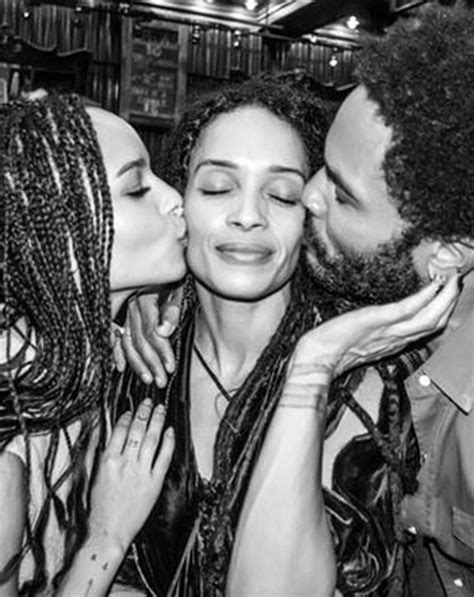 Three People Kissing Each Other At A Party