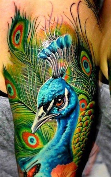 55 Vibrant Peacock Tattoo Designs Art And Design Peacock Tattoo