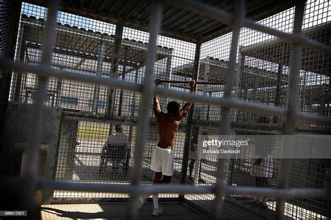 Corcoran State Prison Inmates Spend Time In The Caged Shu Prison Yard