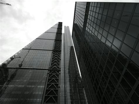 Glass Building Under Gray Sky · Free Stock Photo