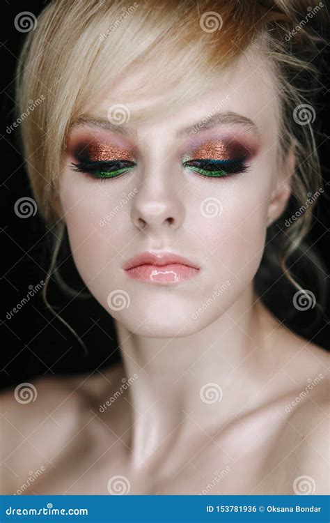 Teenage Girl Portrait Looking Down Beauty Make Up With Glitter Brown And Green Eye Shadows