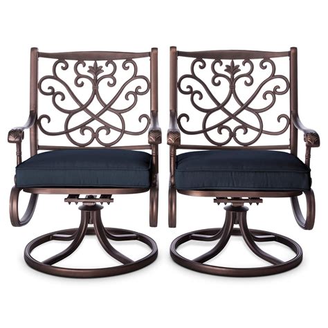It features a navy blue fabric upholstery and is further detailed with silver finish nailhead trim. Folwell 2-pk. Cast Aluminum Swivel Dining Chairs Navy ...