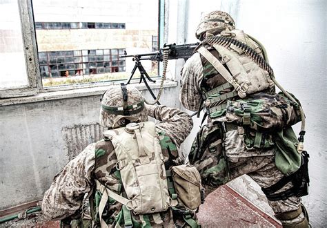 Machine Gunner Shooting Out Of A Window Photograph By Oleg Zabielin