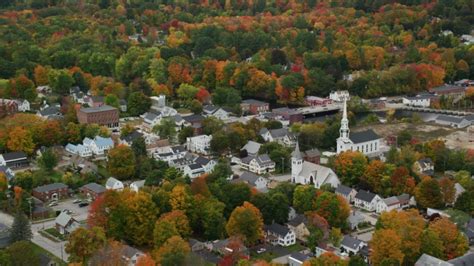 6k Stock Footage Aerial Video Approaching Small Rural Town River