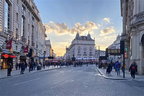 Piccadilly Circus In London A Historic Meeting Place Surrounded By