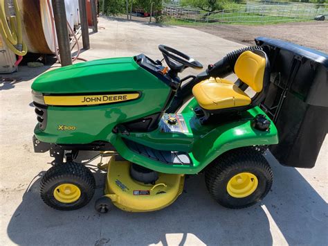 Used John Deere X300 Riding Lawn Mower Ronmowers