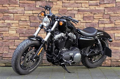The forward foot controls make it not feel cramped for those taller riders while still being close enough. 2016 Harley-Davidson XL1200X Forty Eight Vivid Black LV ...