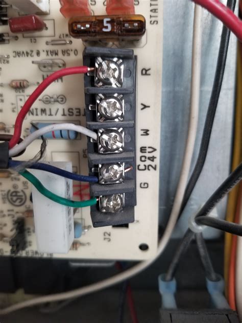 I then traced the thermostat wire to the ac handler side and opened that panel and i can see four bundles of wires connected by wire nuts. I have a Nest thermostat and it isn't getting 12v power to ...