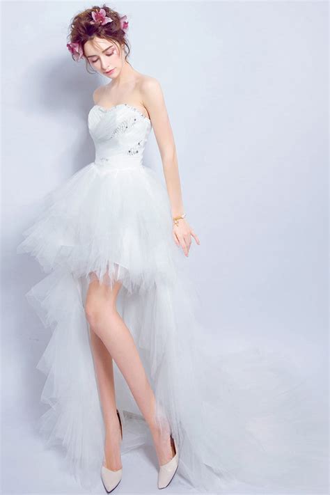 Robe de mariée 2016 en dentelle ivoire avec perles cou translucide asymétrique. Robe mariage 2018 courte devant longue derrière bustier ...