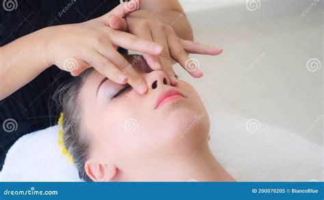 Woman Gets Facial And Head Massage In Luxury Spa Stock Image Image Of Face Beautiful 200070205