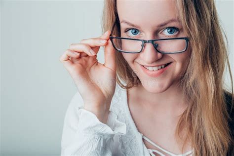 Smiling Young Business Woman Wearing Eye Glasses Looking At The Camera