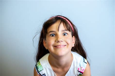 Studio Portrait Of Young Child Girl Making Faces Stock Image Image Of