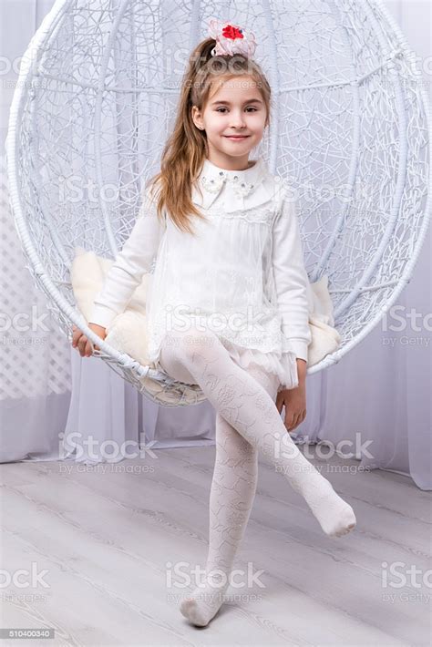 Portrait Of A Little Girl On Swing Stock Photo Download Image Now