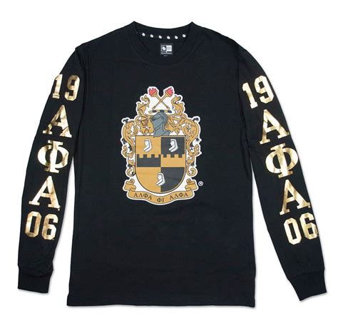 A Black Long Sleeve Shirt With Gold Lettering On The Sleeves And An