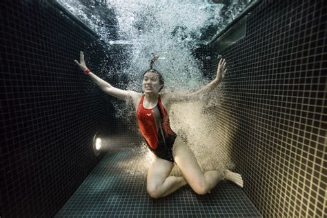 Underwater Portraits Of Divers Plunging Into A Nearly Freezing Pool
