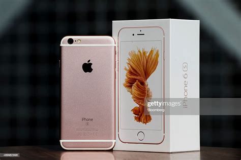 An Apple Inc Iphone 6s Smartphone Stands Next To A Packaging Box In News Photo Getty Images