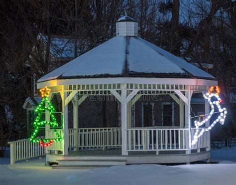 Snow Covered Gazebo With Christmas Lights Decorations Stock Photo