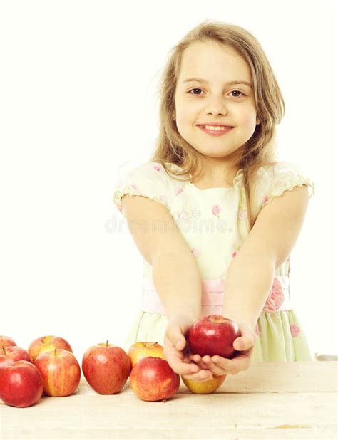 Child Or Little Girl Eating Apple Isolated On White Background Stock