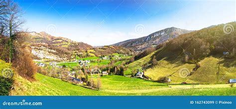 Panoramic View Of Typical Village Located In Green Valley Stock Image