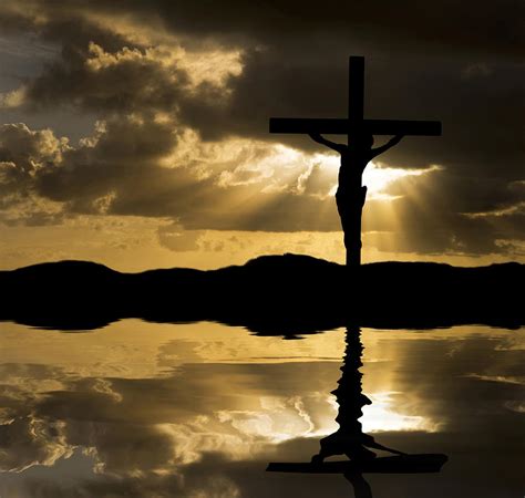 Jesus Christ Crucifixion On Good Friday Silhouette Reflected In