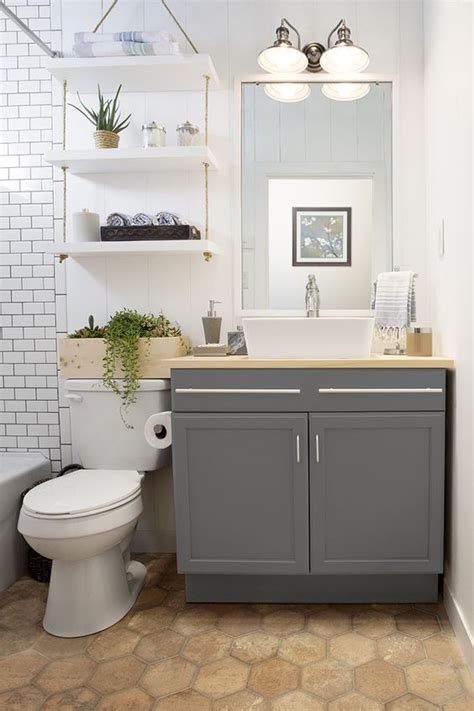 The issue is the toilet is not centered on the wall. Obsessed With Hanging Shelves - Simple DIY Ideas You'll Love